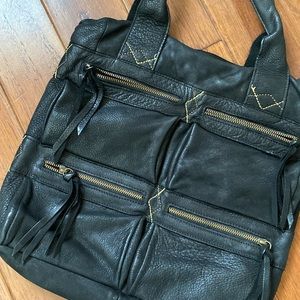 Hip durable, black leather shoulder bag